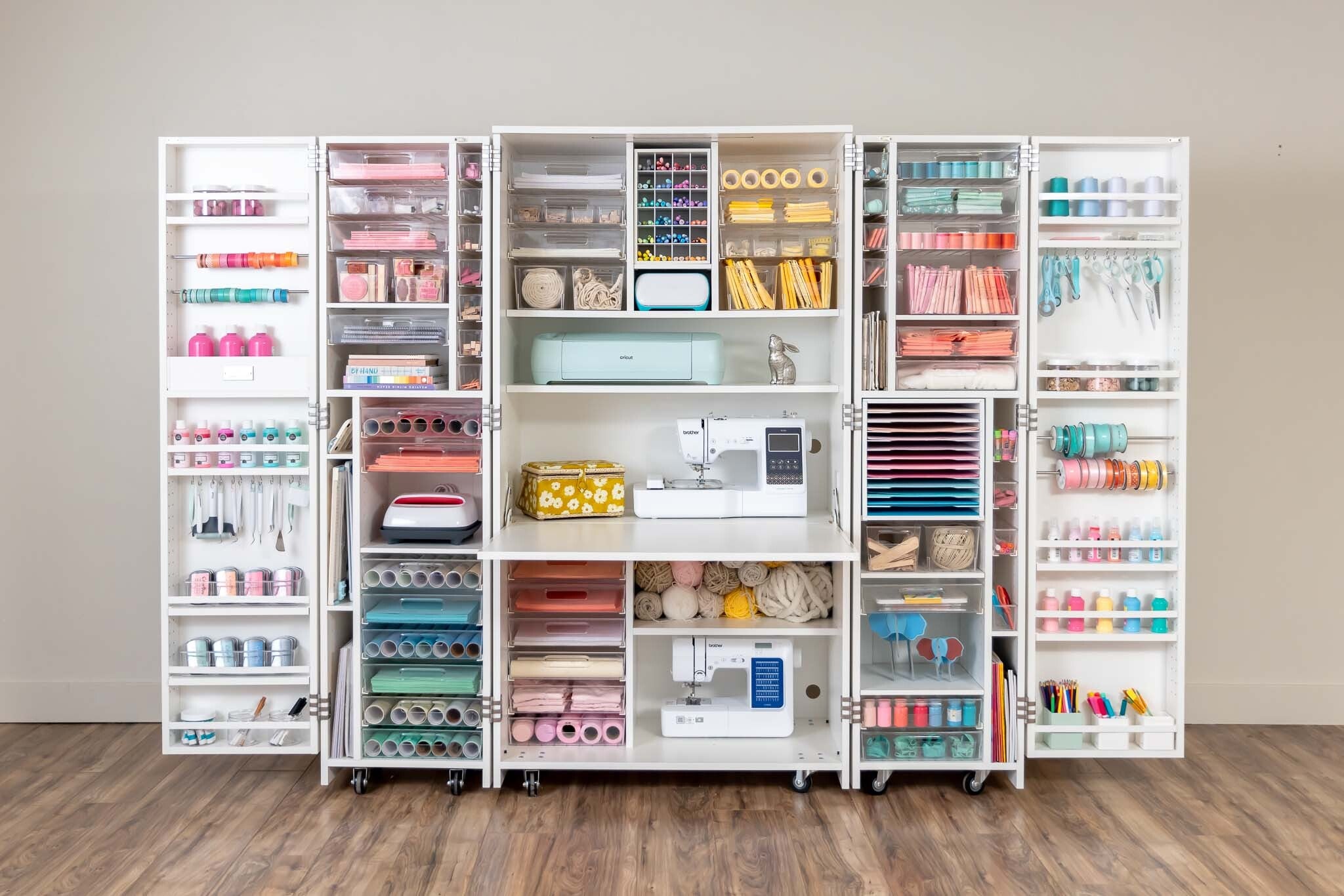 DreamBox Craft Station by Craft Room Hides Within a Cabinet  Craft storage  cabinets, Sewing room design, Craft tables with storage
